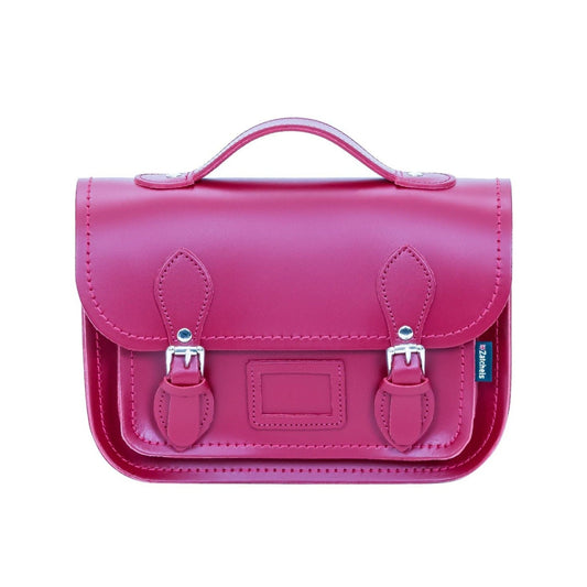 Handmade Leather Midi Satchel in vibrant magenta, showcasing intricate craftsmanship with premium quality leather, perfect for a stylish accessory.