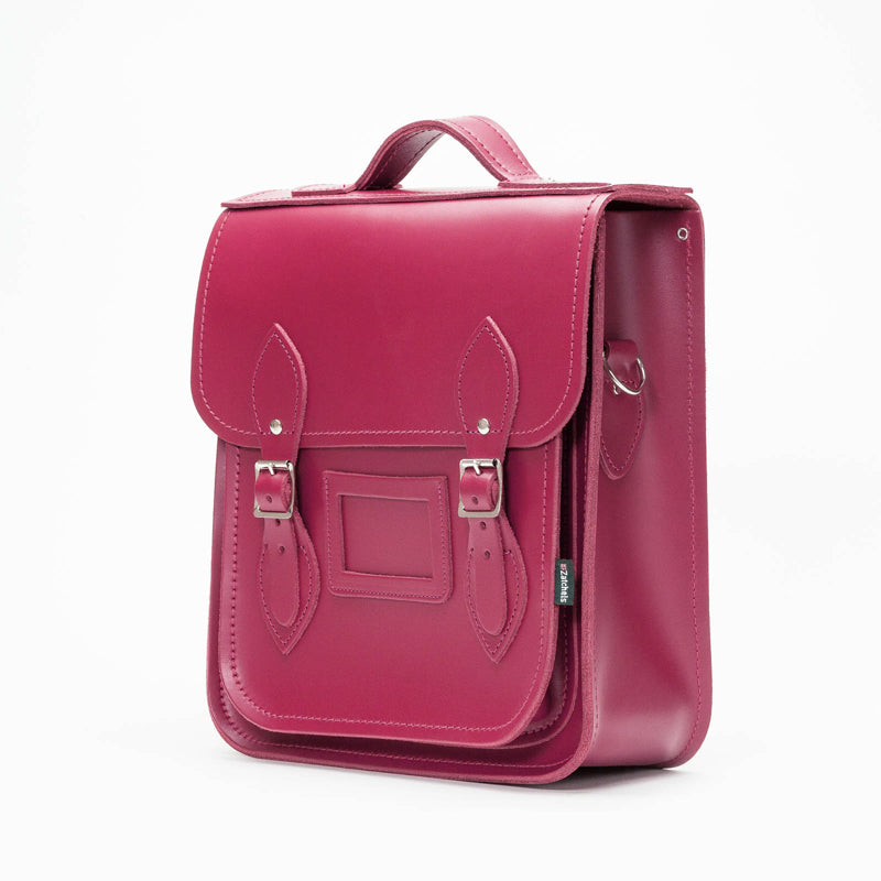 Premium Handmade Leather City Backpack in vibrant Magenta, showcasing exquisite British craftsmanship for urban adventures.