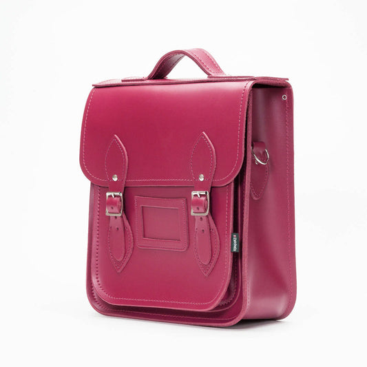 Premium Handmade Leather City Backpack in vibrant Magenta, showcasing exquisite British craftsmanship for urban adventures.