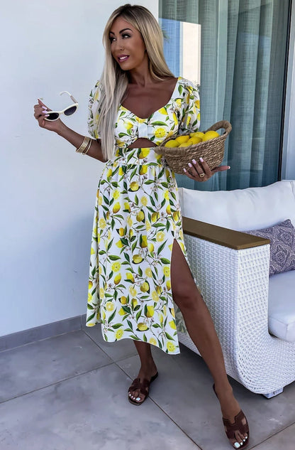 Stylish Low-Cut Neckline of the Zesty Lemon Dress featuring a Padded Bust for a Flirty Silhouette.