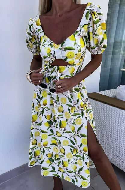 Chic Cut-Out Midriff and Breathable Side Slits of the Zesty Lemon Midi Dress, ideal for warm-weather wear.