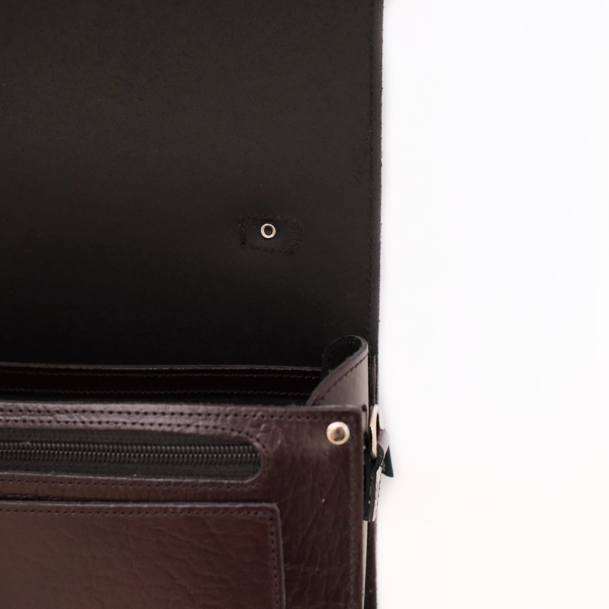 Lifestyle image featuring the Luxury Leather Sugarcube Grande Bag in marsala red, epitomising sophistication and timeless luxury.