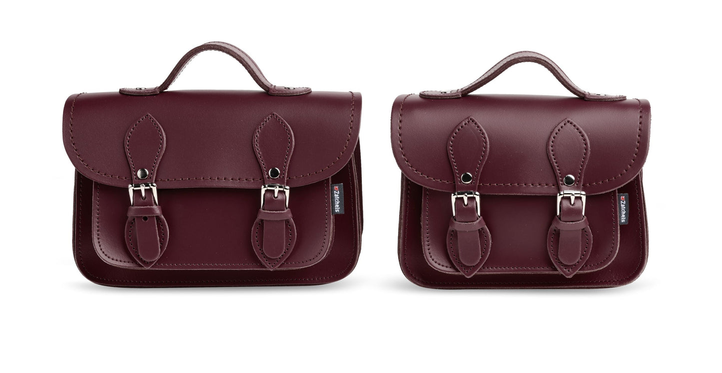 Detail of the matching stitching and nickel silver buckles on the Handmade Marsala Red Leather Micro Satchel, highlighting its luxurious quality and practicality.