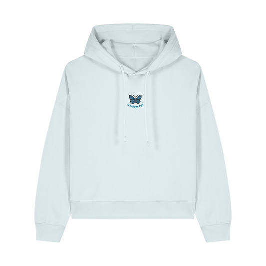 Adonis Blue Butterfly Cropped Hoodie showcasing elegant sky-blue embroidery on a crisp white fabric, embodying nature's serene beauty and relaxed unisex fit.