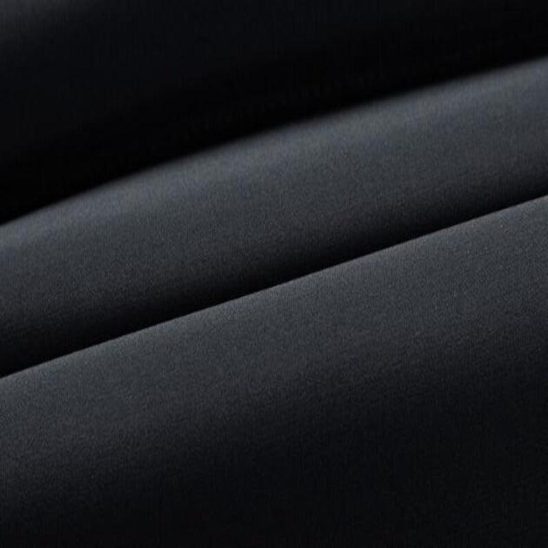 Luxurious men's vest jacket with padded features and high neck, demonstrating versatility and sophistication for sophisticated layering in varied climates.