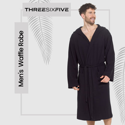 Stylish luxury men's hooded bathrobe laid out to highlight its adjustable front tie belt and cozy hood, combining elegance with practicality in black cotton.