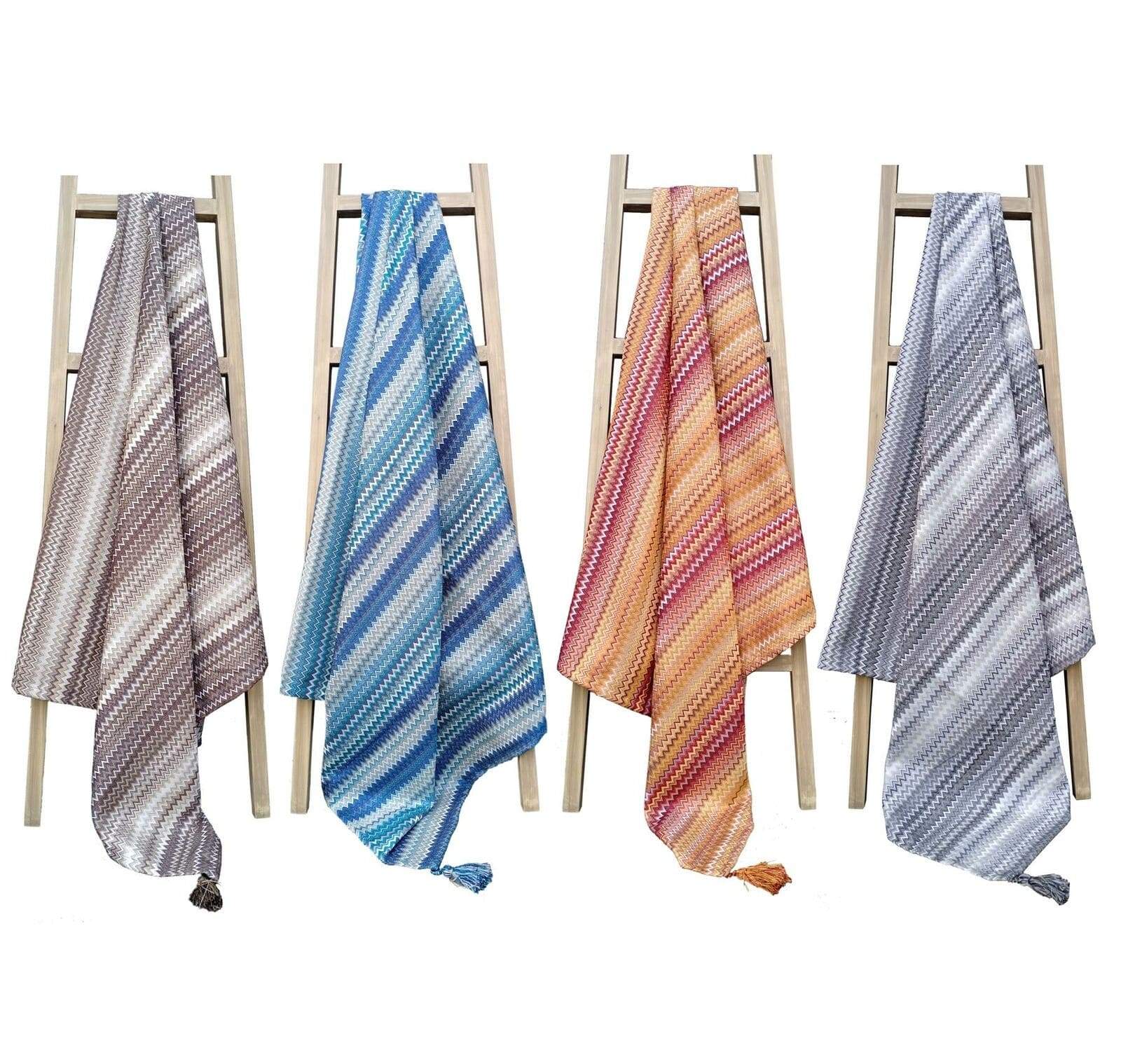 Mia Bohemian Throw Blanket featuring luxurious soft polyester with intricate tribal stripes and elegant tasselled edges, measuring 130x150 cm, perfect for enhancing your home decor.