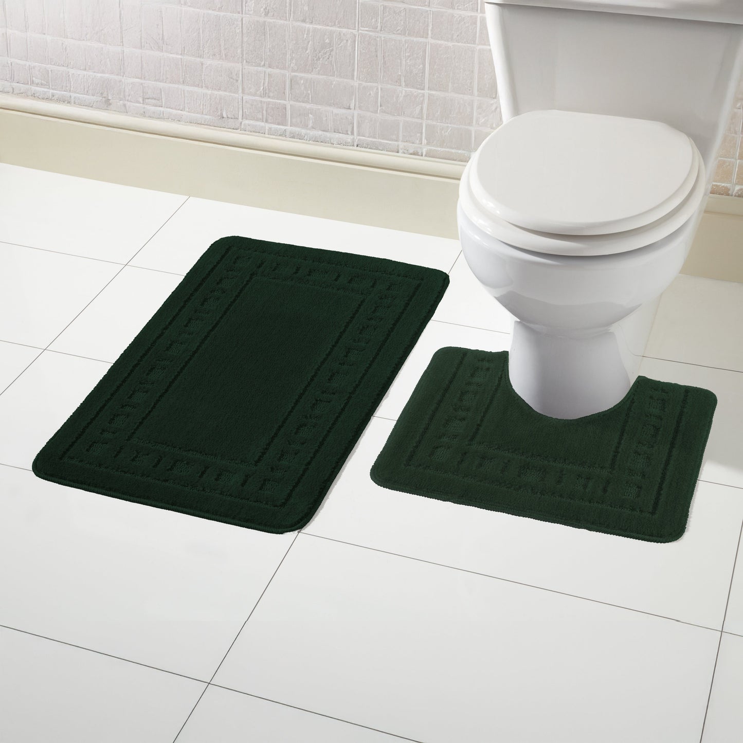 Luxurious emerald green bath mat and pedestal set featuring a plush texture for ultimate bathroom comfort and a sophisticated design.