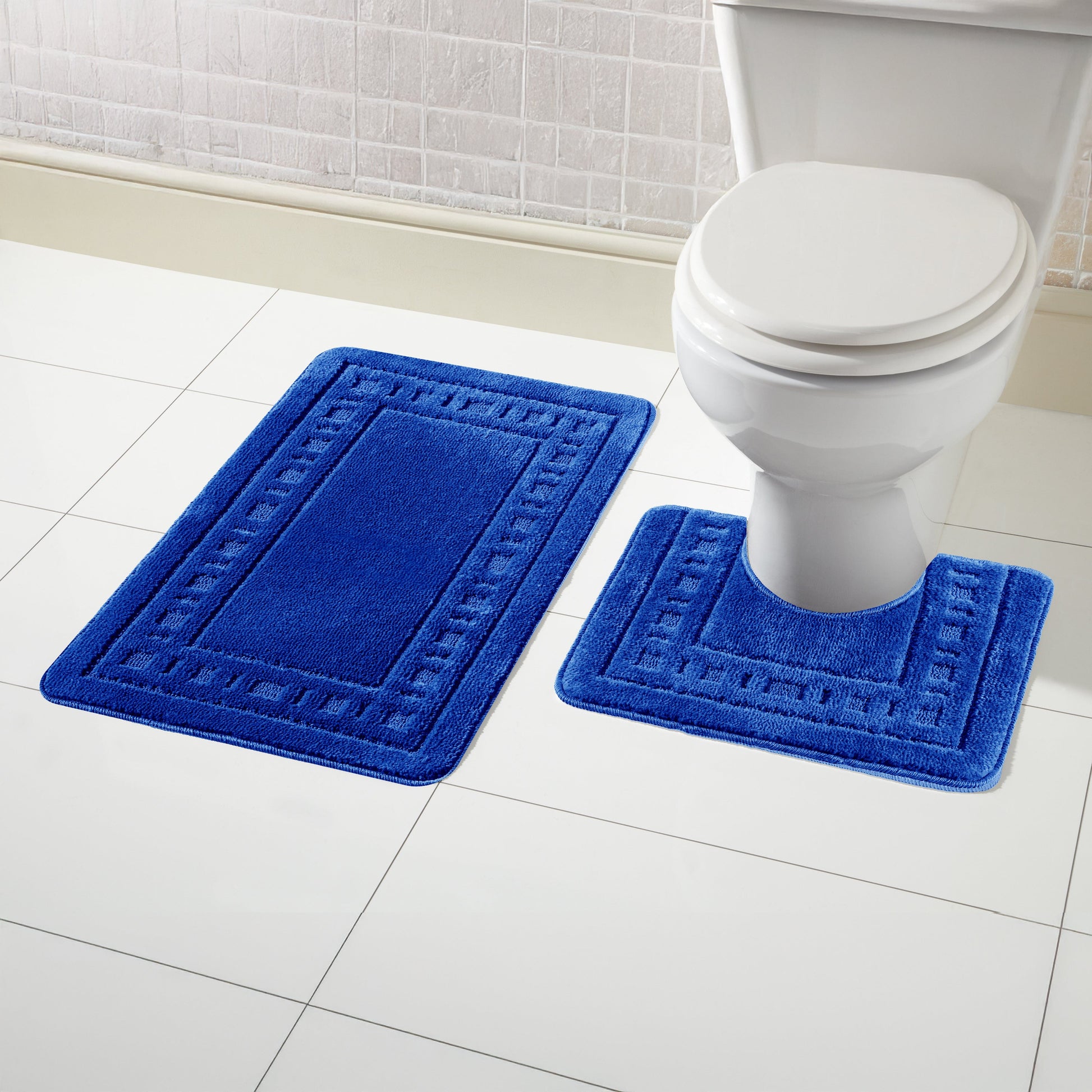 Luxurious Miami 2 Piece Royal Blue Non-Slip Bath Mat & Pedestal Set by OLIVIA ROCCO, showcasing a soft and plush surface designed for comfort and elegance in any bathroom.