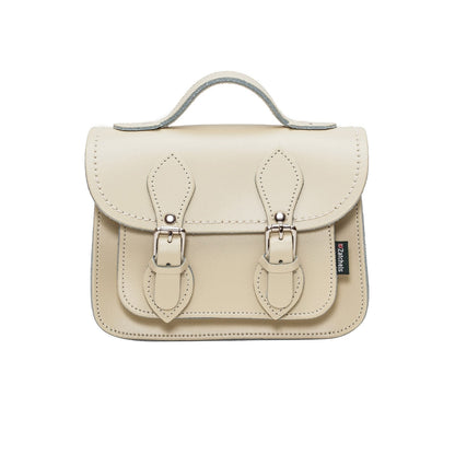 Zatchels Handmade Leather Micro Satchel in Pastel Cream, showcasing premium leather craftsmanship and chic nickel silver buckles, perfect for adding elegance to any outfit.