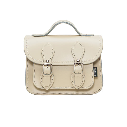 Zatchels Handmade Leather Micro Satchel in Pastel Cream, showcasing premium leather craftsmanship and chic nickel silver buckles, perfect for adding elegance to any outfit.