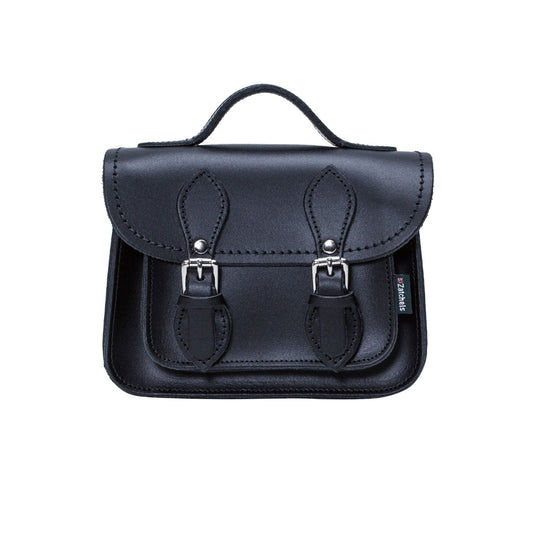 Elegant handmade navy leather micro satchel with adjustable strap, showcasing its exquisite design and craftsmanship from Zatchels.