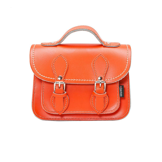 Handmade orange leather micro satchel by Zatchels featuring luxurious craftsmanship and vibrant colour, perfect for fashion enthusiasts.