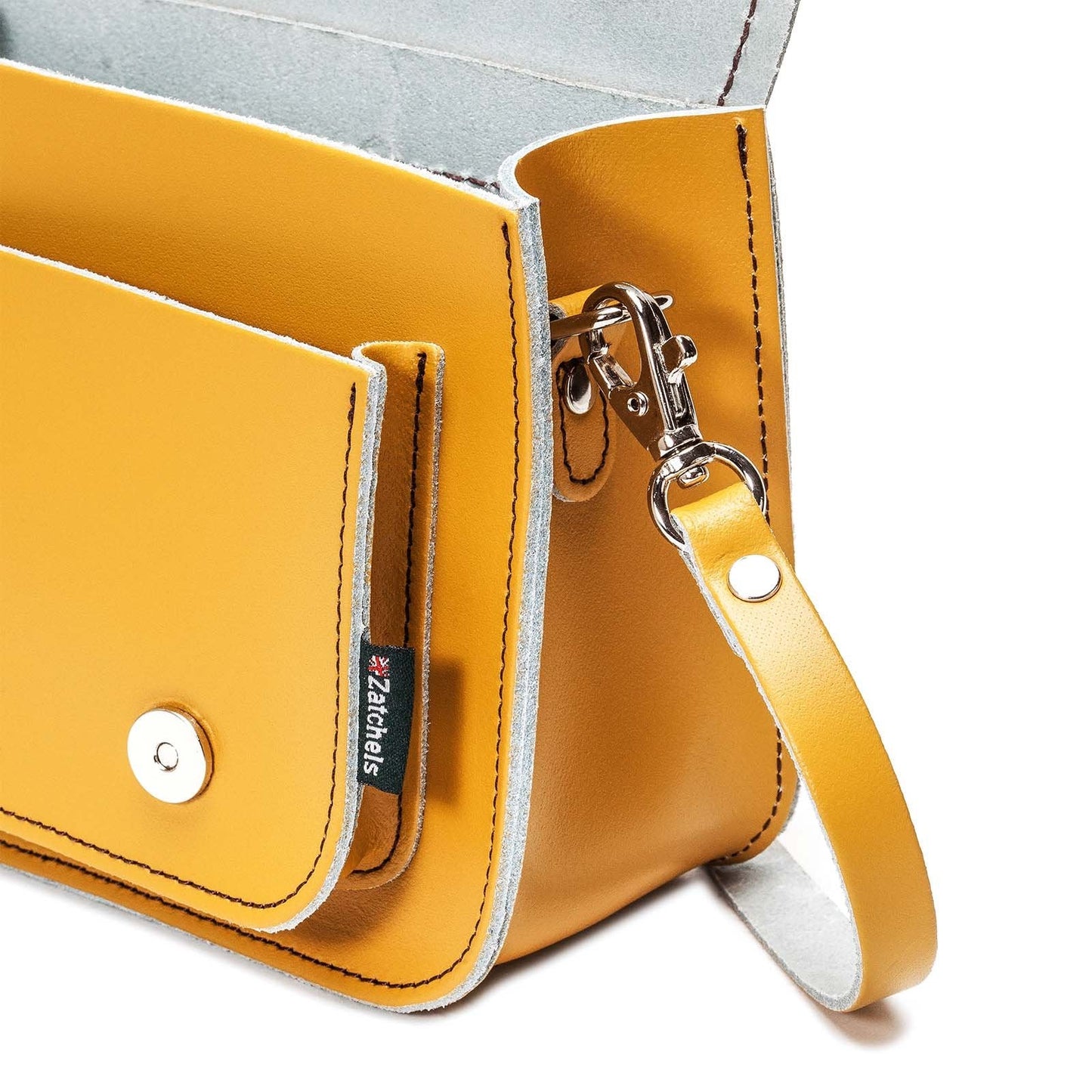 Stylish Handmade Yellow Ochre Leather Micro Satchel presented against a chic background, illustrating its smart storage features and sophisticated appeal for modern women.