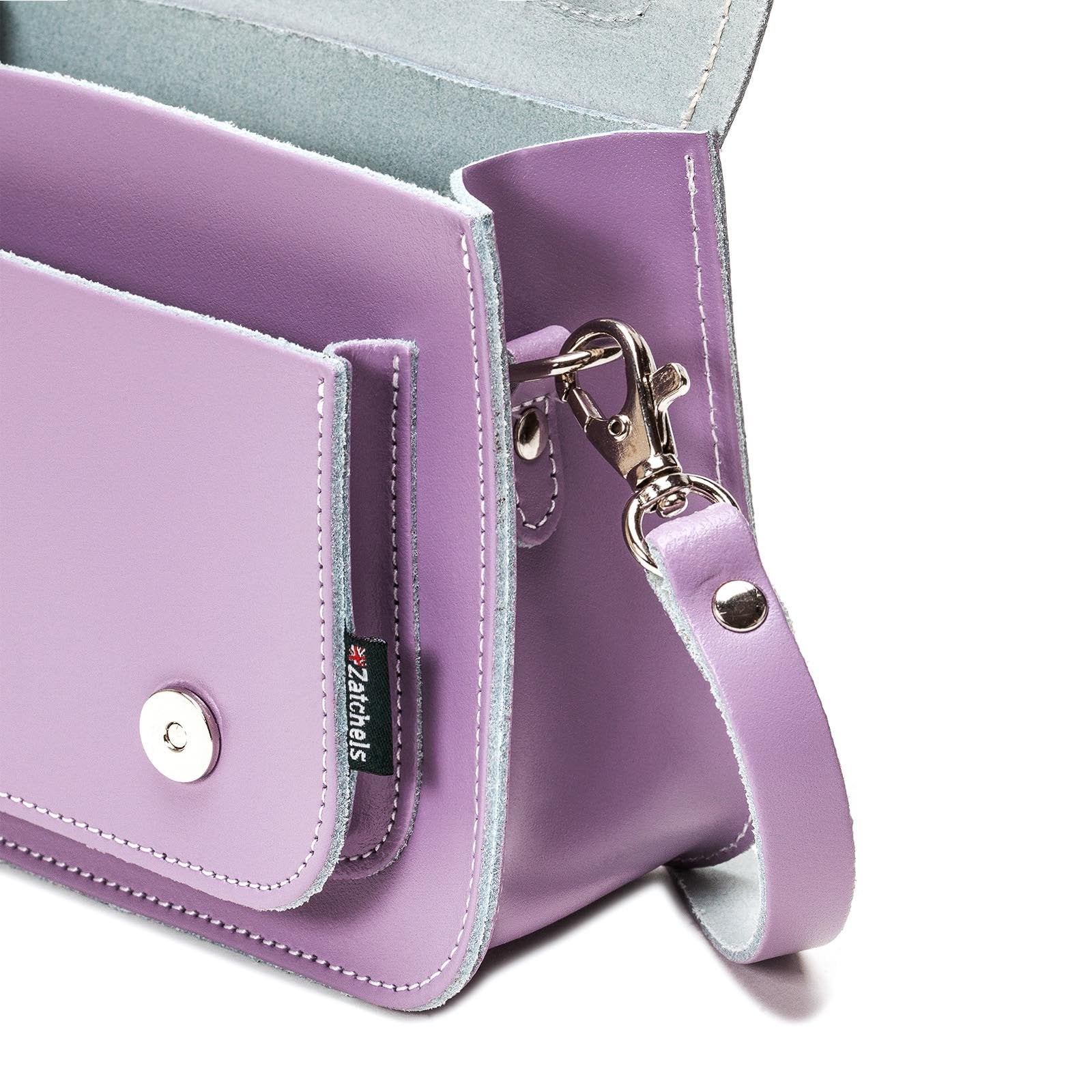 Luxury Handmade Leather Micro Satchel in Pastel Violet with adjustable strap, showcasing exquisite craftsmanship in a stylish and functional design.