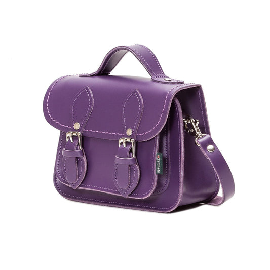 Detail shot of the exquisite stitching and nickel silver buckles on the Handmade Purple Leather Micro Satchel, highlighting superior craftsmanship and premium quality.