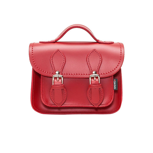 Exquisite Handmade Red Leather Micro Satchel with adjustable shoulder strap, showcasing luxury craftsmanship and elegant design.