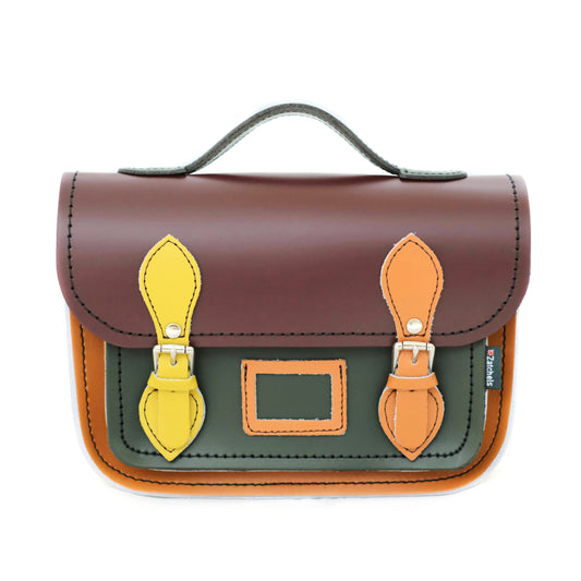 Handmade Leather Midi Satchel in Autumnal Kaleidoscope design by Zatchels, showcasing vibrant colours of Marsala Red, Ivy Green, Burnt Orange, and Yellow Ochre, featuring an adjustable strap and elegant top handle, perfect for any chic outfit.