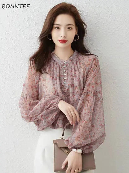 Elegant Women's Chiffon Blouse in luxurious design by Dazzling Dreams Studio, featuring a high neck and gathered sleeves for sophisticated style.