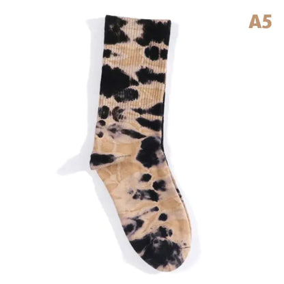 Luxurious Women's Tie-Dye Middle Tube Socks in a stunning beige and black pattern, ideal for vibrant comfort and stylish expression.