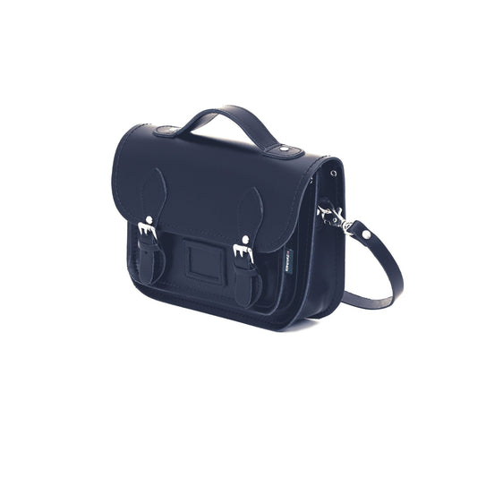 Versatile Navy Leather Midi Satchel with adjustable strap, perfect for carrying plus-sized smartphones and daily essentials.