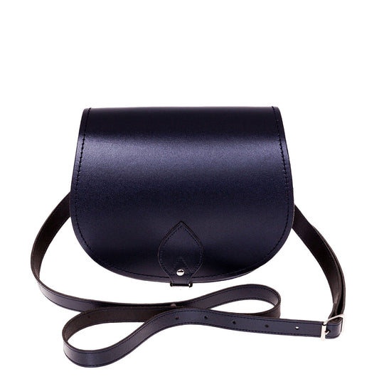 Elegant handmade navy leather saddle bag featuring a classic design with contrasting stitching, ideal for elevating your fashion statement.