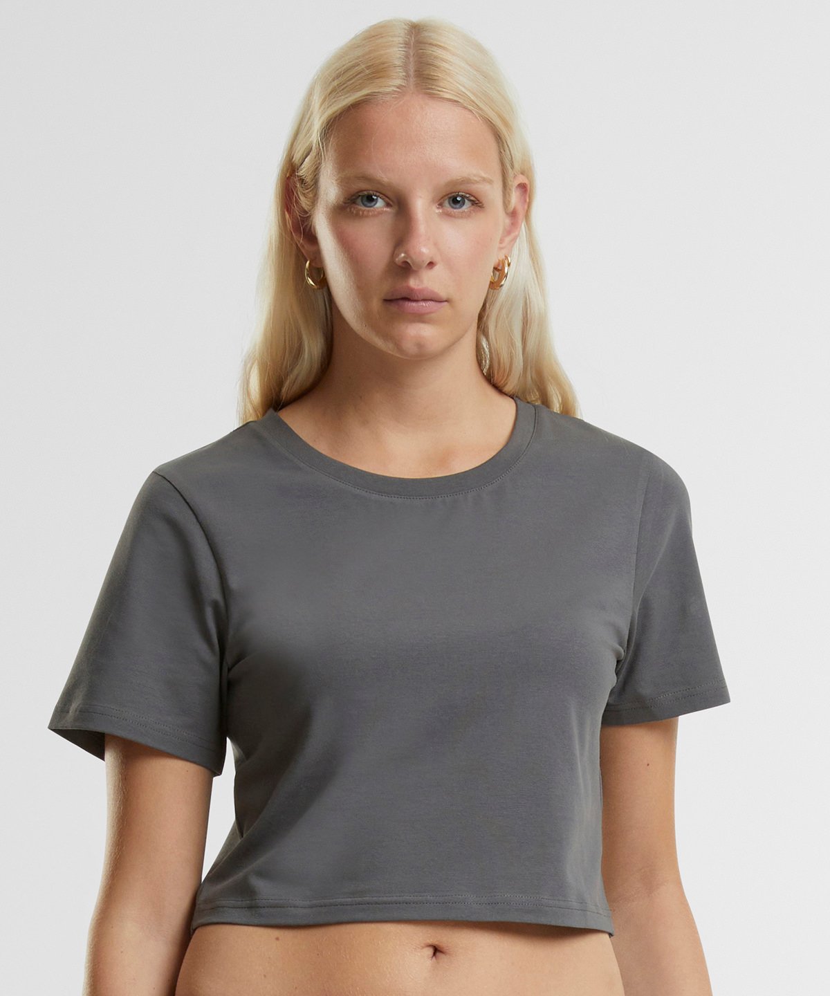Close-up of the soft texture of an organic cotton cropped t-shirt for women, highlighting its 95% organic cotton blend and luxurious feel.