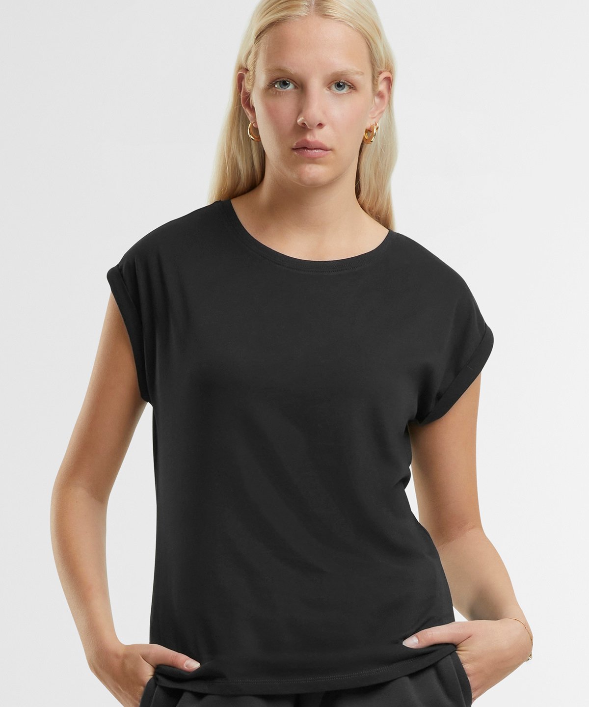 Elegant display of the one size fits most luxury organic cotton t-shirt for women, emphasising its chic design and style.