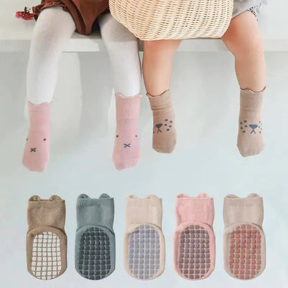 Charming Women's Girls Non Slip Safety Winter Warmer Grippy Socks displayed on little feet, showcasing various adorable designs and textured grippy soles.