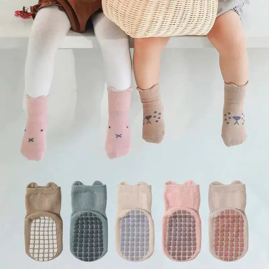 Charming Women's Girls Non Slip Safety Winter Warmer Grippy Socks displayed on little feet, showcasing various adorable designs and textured grippy soles.