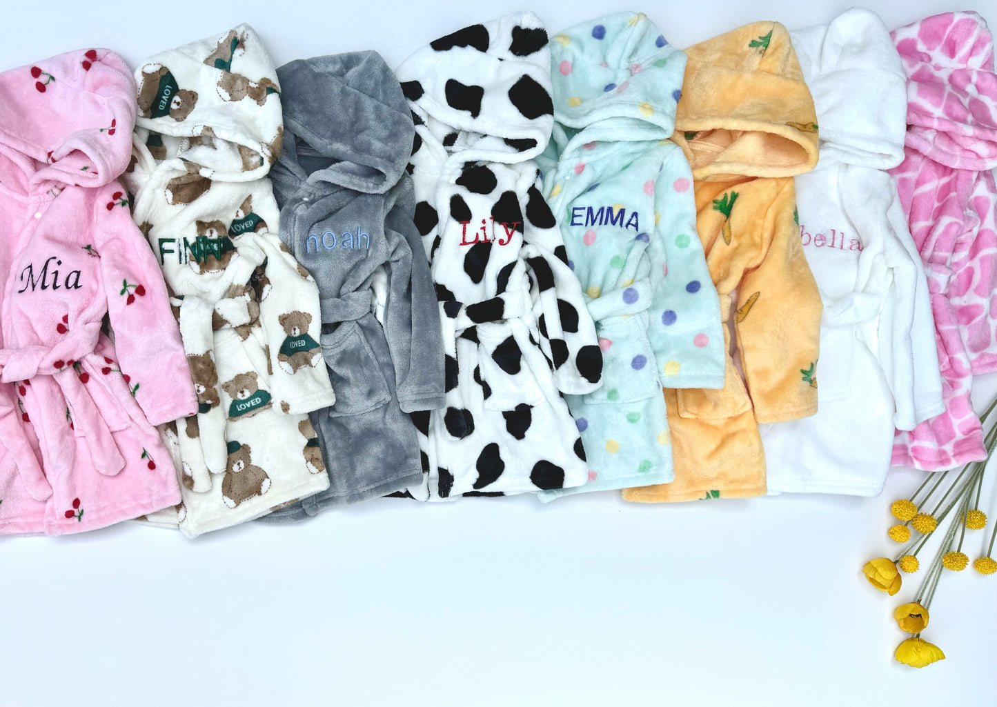 Luxurious personalised embroidered baby robe by DreamBuy, showcasing a charming cherry print, perfect for newborns to 3 years old.