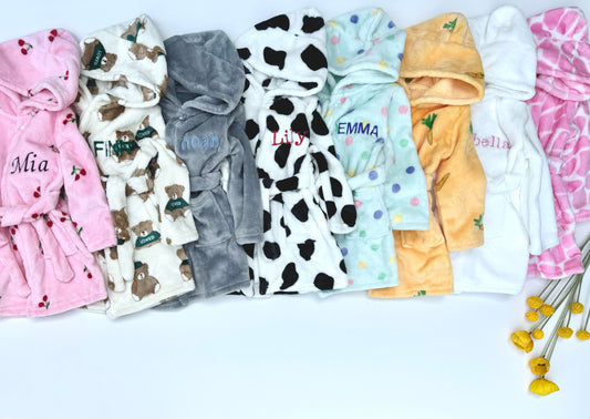 Luxurious personalised embroidered baby robe by DreamBuy, showcasing a charming cherry print, perfect for newborns to 3 years old.