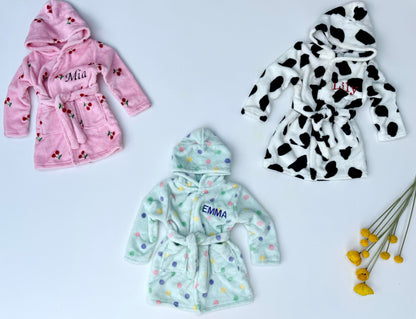 Cozy newborn bathrobe by DreamBuy adorned with cuddly teddy print, ideal for comforting your little one.