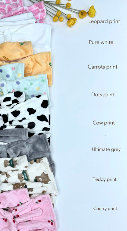 Elegant baby robe by DreamBuy, featuring a cuddly teddy design, designed for ultimate comfort and style for infants and toddlers.