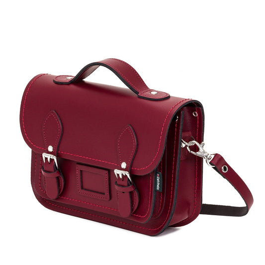 Elegant Oxblood Leather Midi Satchel displayed on a chic background, highlighting its spacious interior perfect for daily essentials.