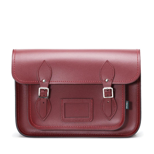 Oxblood Red Handmade Leather Satchel showcasing premium craftsmanship, featuring a classic design with adjustable strap and silver nickel buckles.