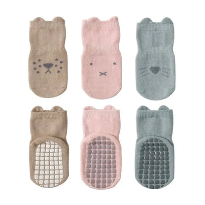 Luxurious Women's Girls Non-Slip Safety Winter Warmer Grippy Socks showcasing adorable animal-inspired designs in soft hues, perfect for style and comfort.