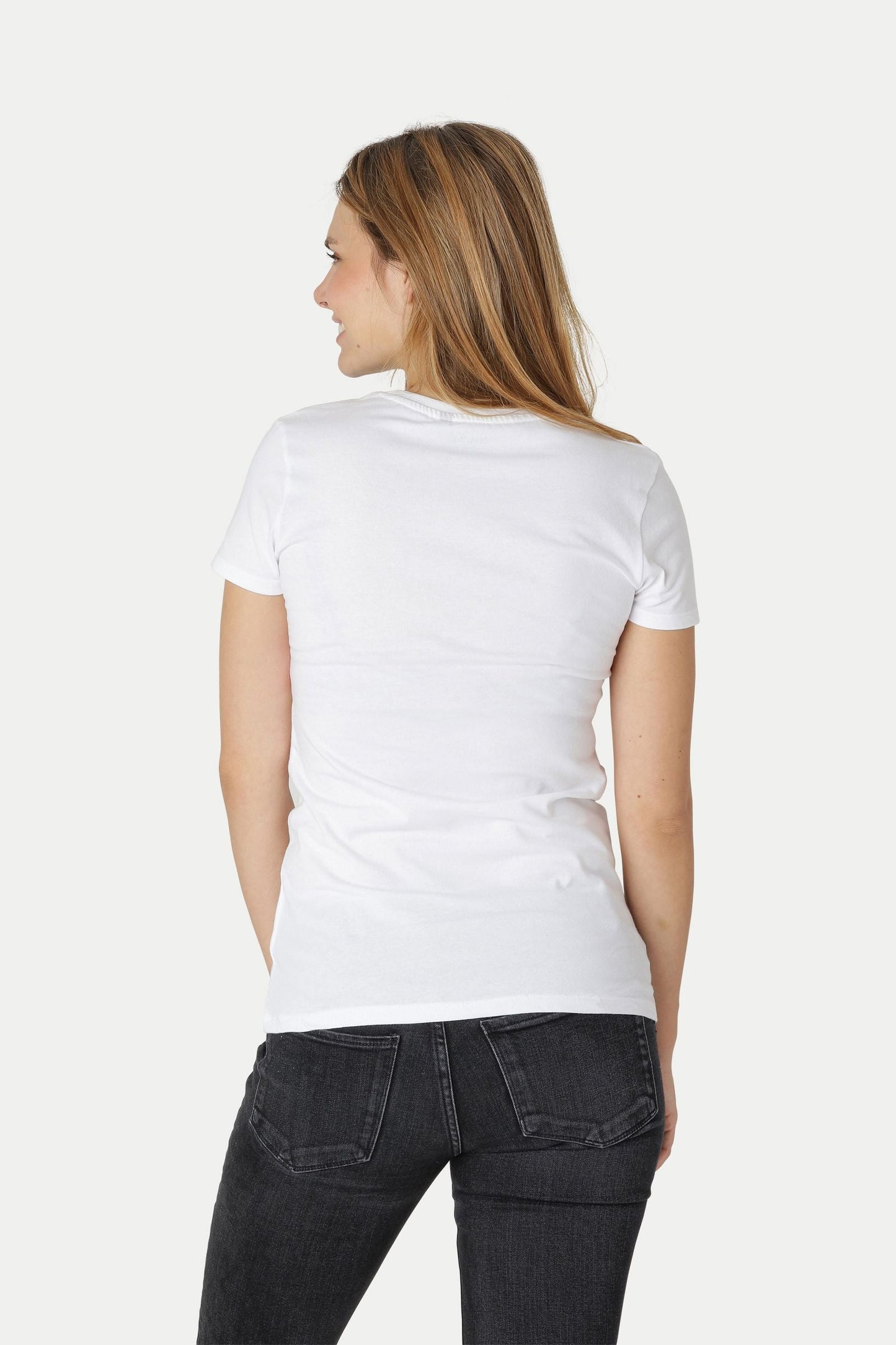 Crafted from 100% organic Fairtrade cotton, this slim fit T-shirt exemplifies sophisticated casual wear, combining comfort with a stylish, eco-friendly ethos.