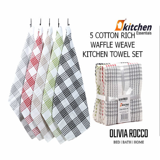Stylish houndstooth kitchen tea towel displayed on a countertop, highlighting its chic pattern and functionality in a refined kitchen setting.