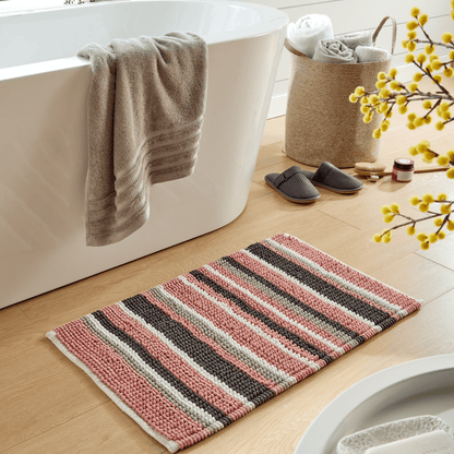 Close-up of the sumptuous fabric of the Padstow Stripe Bathmat, illustrating its perfect blend of softness and resilience for a comfortable bathroom experience.