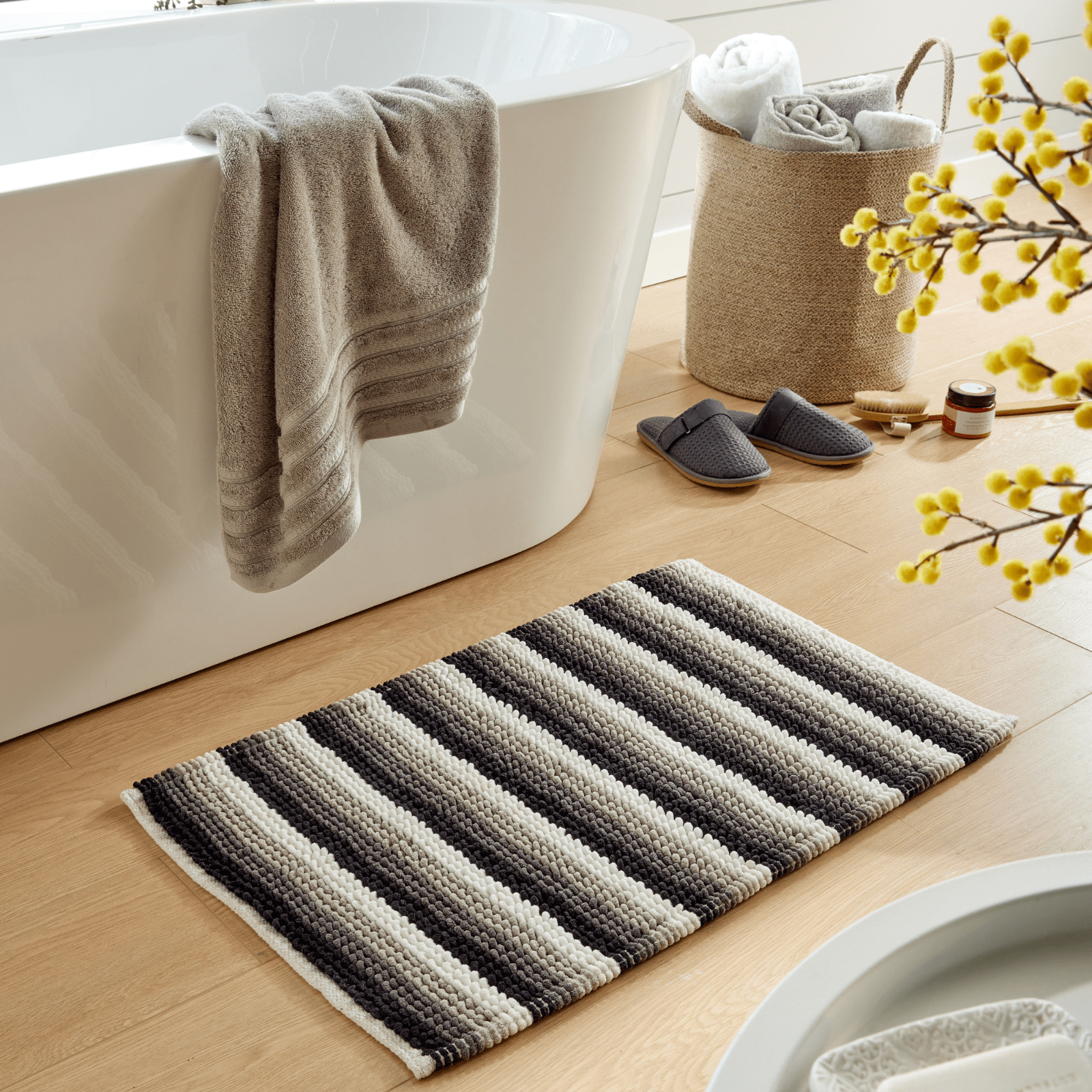 Close-up of the Padstow Stripe Bathmat showcasing its plush texture and durability, perfect blend of polyester and cotton for ultimate softness.