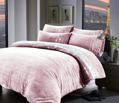 Luxurious Paris Glitz Teddy Fleece Duvet Set featuring handwoven diamante detailing on a plush teddy fabric, ideal for creating an elegant bedroom atmosphere.