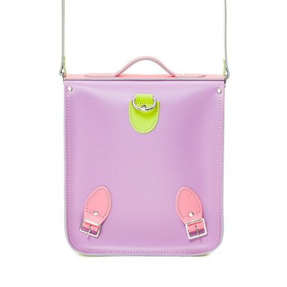 Versatile Pastel Kaleidoscope Handmade Leather City Backpack worn as a shoulder bag, highlighting its chic design and vibrant colours, ideal for a sophisticated yet practical accessory.