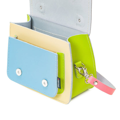 Model wearing the Rose Quartz Micro Satchel in small, demonstrating its stylish design and perfect fit for casual outings.