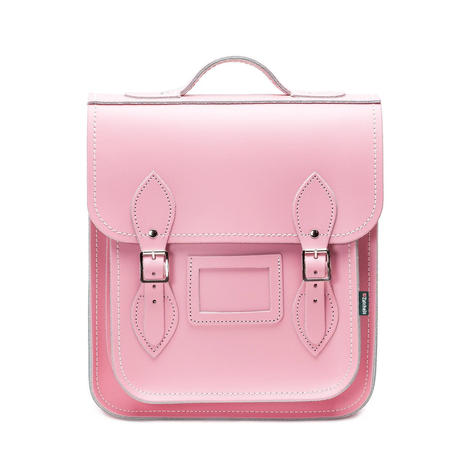 Handmade Leather City Backpack in pastel pink, showcasing exquisite British craftsmanship and elegant design, featuring silver nickel buckles and adjustable straps, perfect for city explorers.