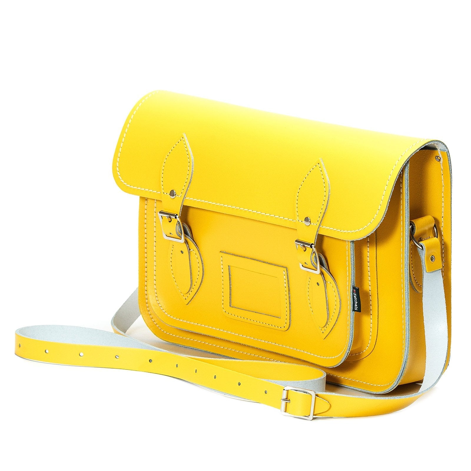 Luxury Handmade Leather Satchel in Pastel Daffodil Yellow showcasing adjustable strap and personalisation options, crafted with traditional British craftsmanship.