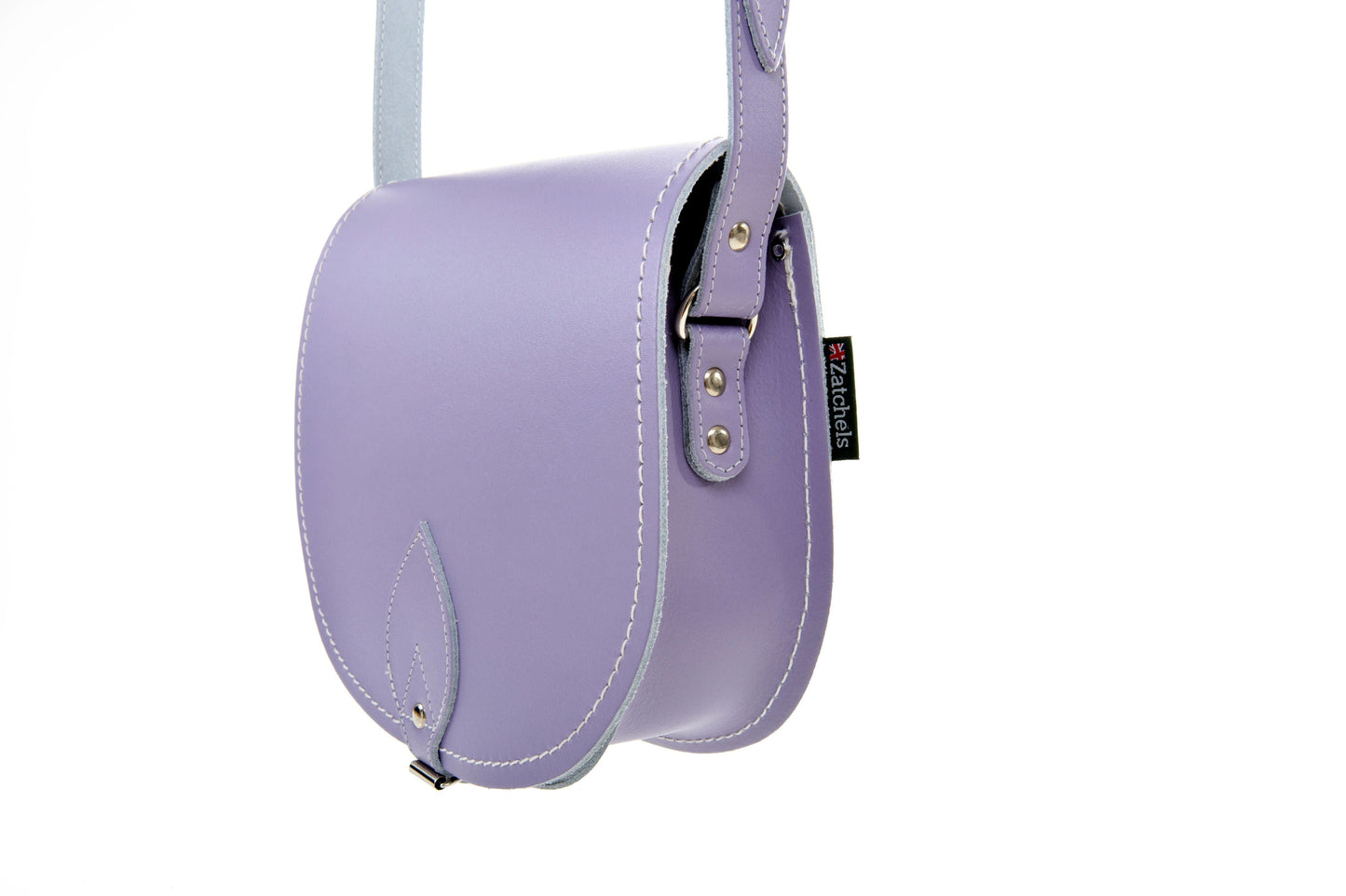 Elegant Handmade Pastel Violet Leather Saddle Bag opened to reveal spacious interior, designed with traditional buckle closure and exquisite contrasting stitching.
