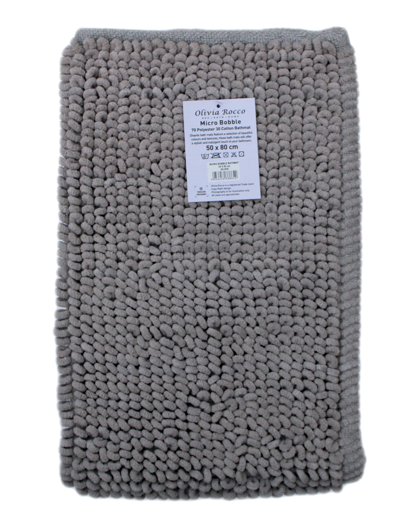 Spacious bathroom featuring the Pebbles Micro Bobble Eco-Friendly Bath Mat in a stylish setting, complementing modern decor with its plush and delicate appearance.