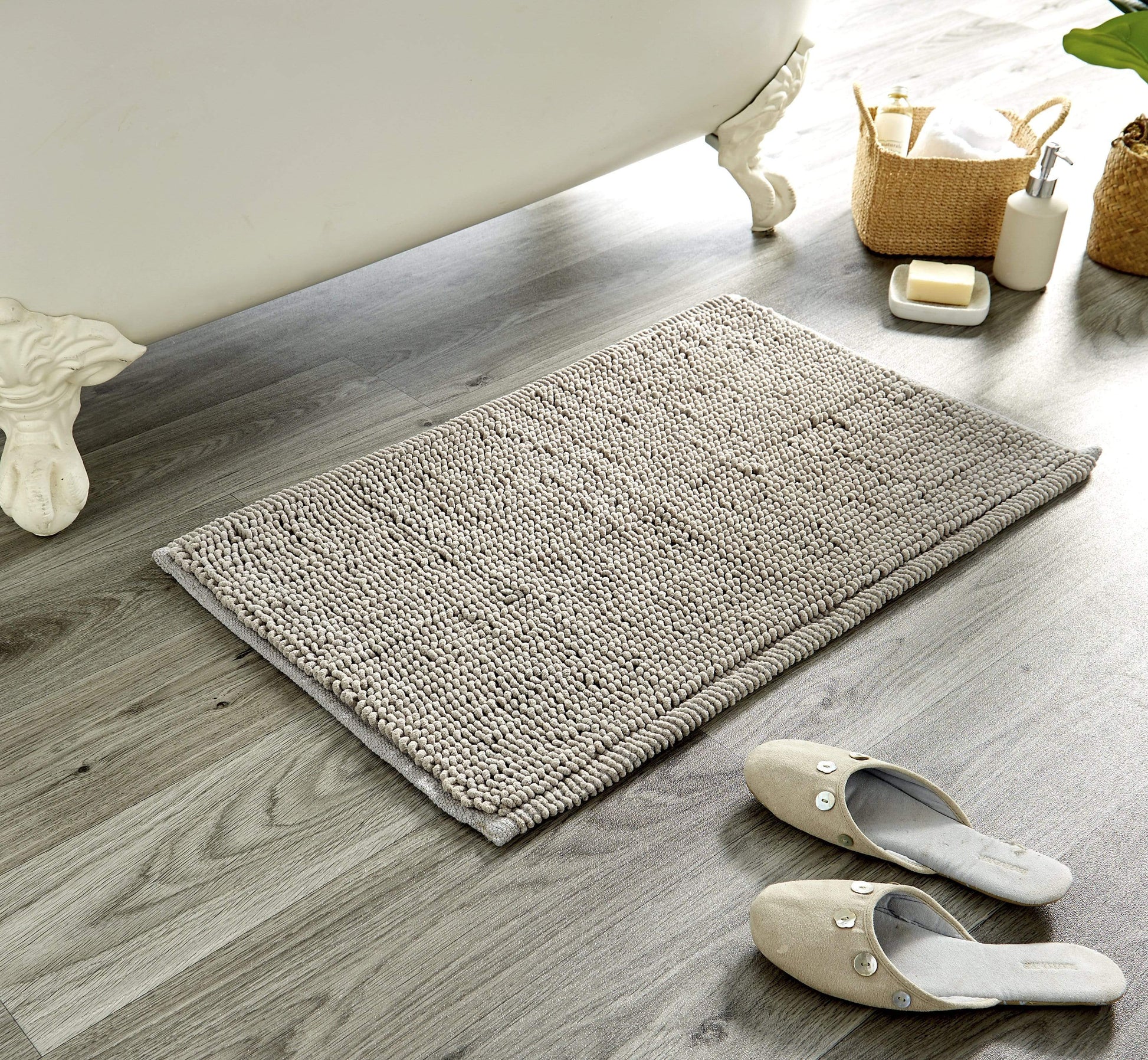 Soft and plush Pebbles Micro Bobble Bath Mat in a neutral tone, designed for maximum absorbency and quick-drying functionality.