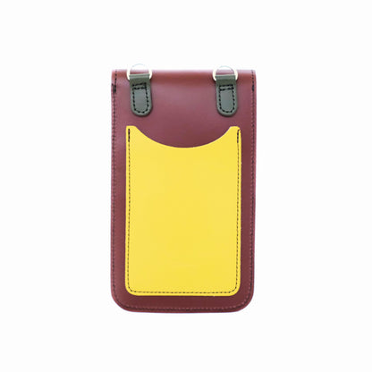 Close-up of the Zatchels Handmade Leather Mobile Phone Pouch, showcasing the intricate detail of the autumnal kaleidoscope pattern and multiple pockets for organisation.